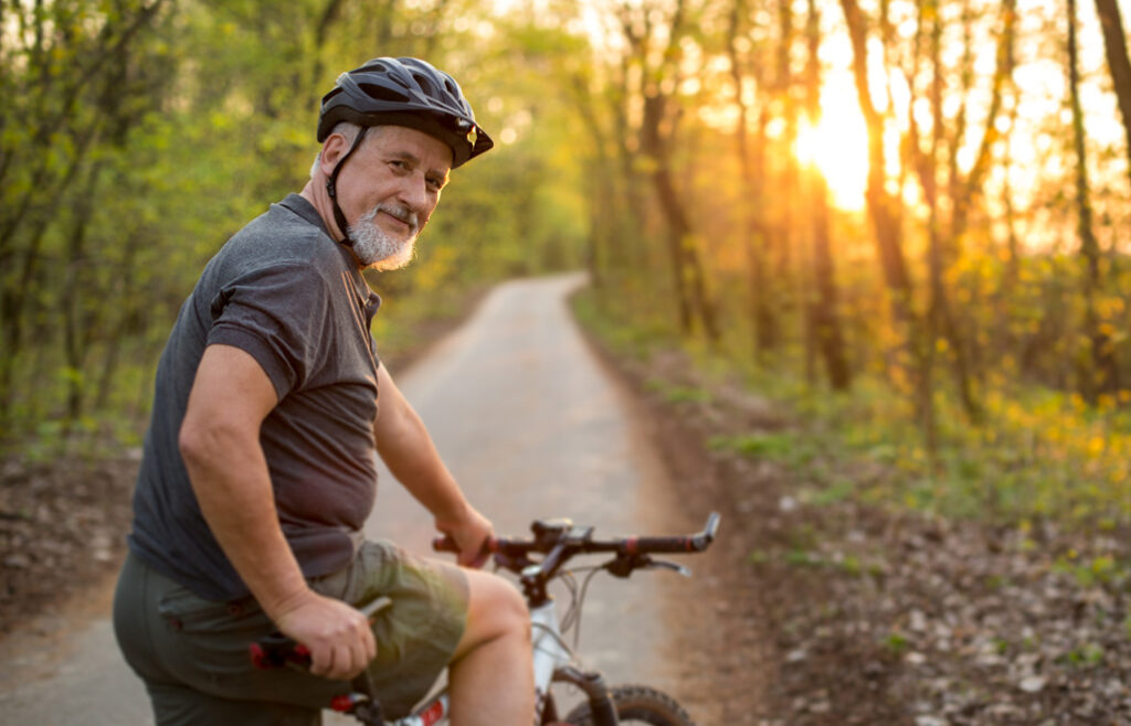 Man on bike in the woods